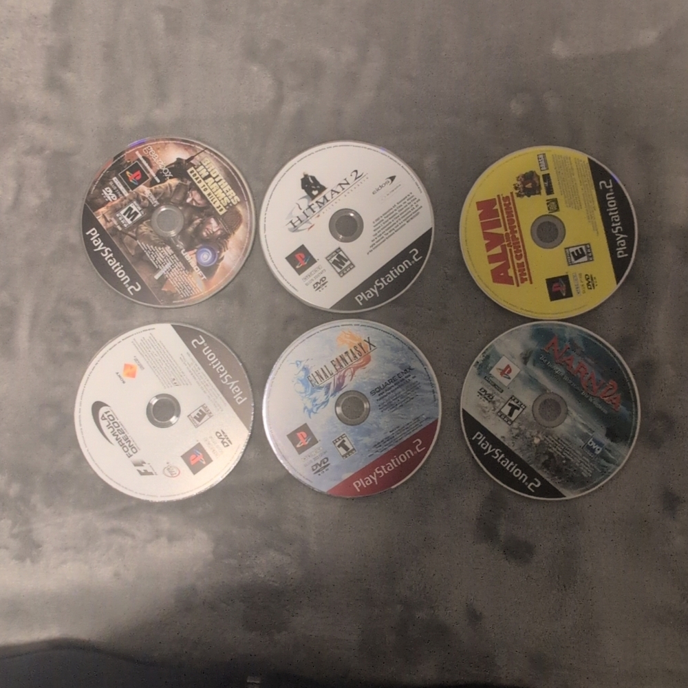 Sony PlayStation 2 Disc Bundle with Verizon Case, Games Untested